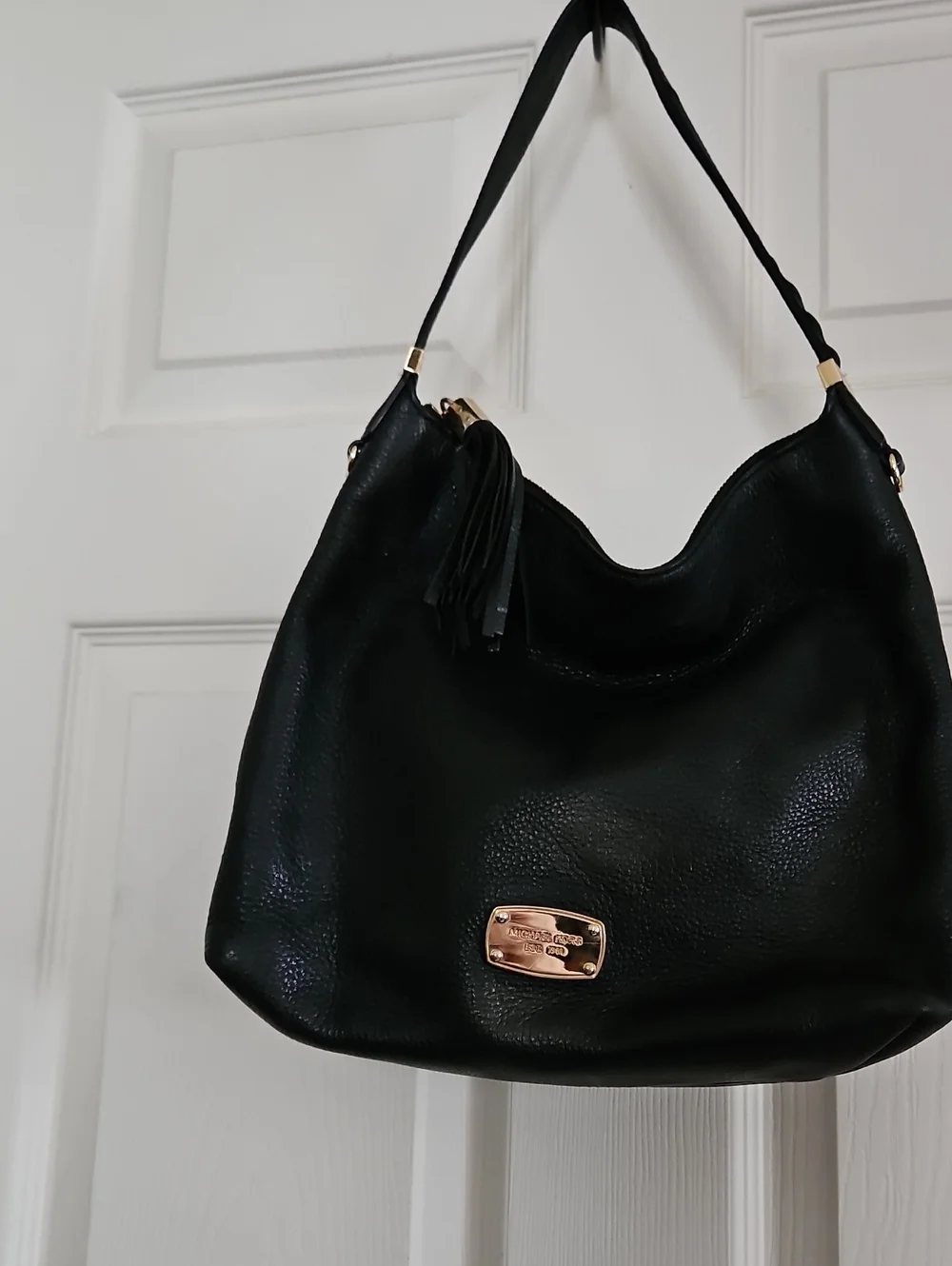 Michael Kors Black Pebbled Leather Hobo with Tassel and Gold Plaque